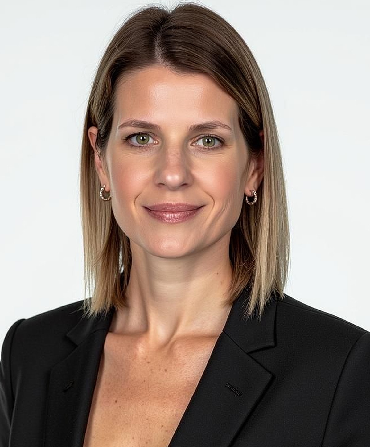 Close-up of a woman's face with flowing hair.