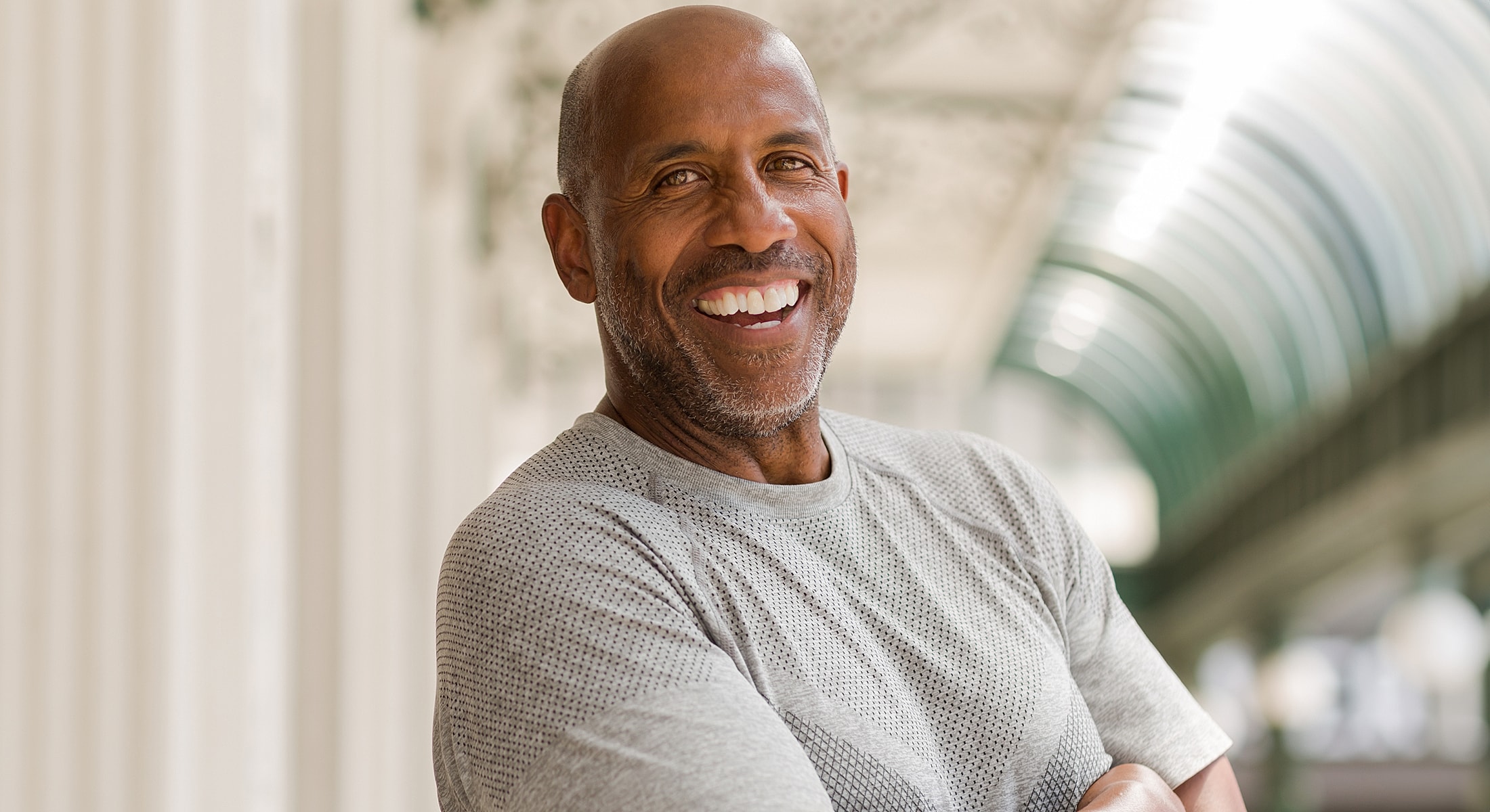 Smiling man in a casual setting.