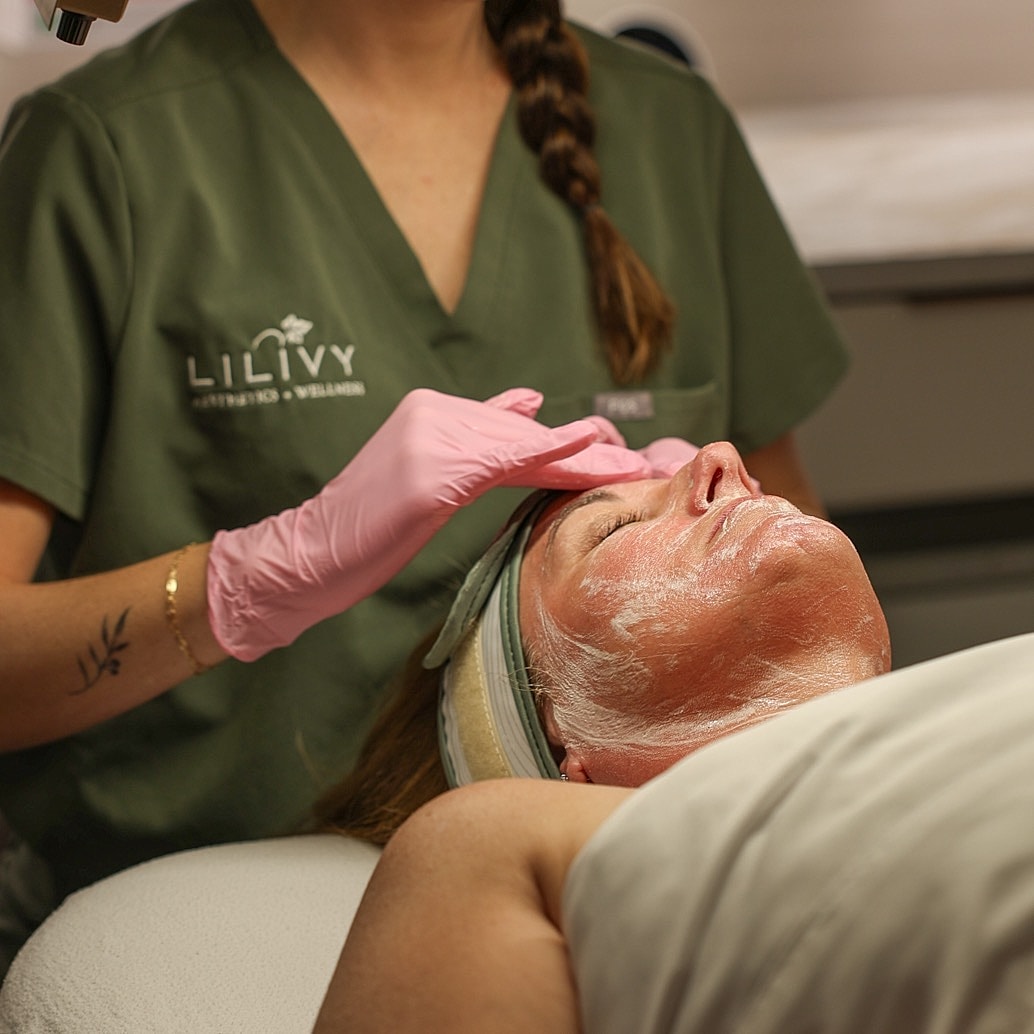 Facial treatment at a wellness center.